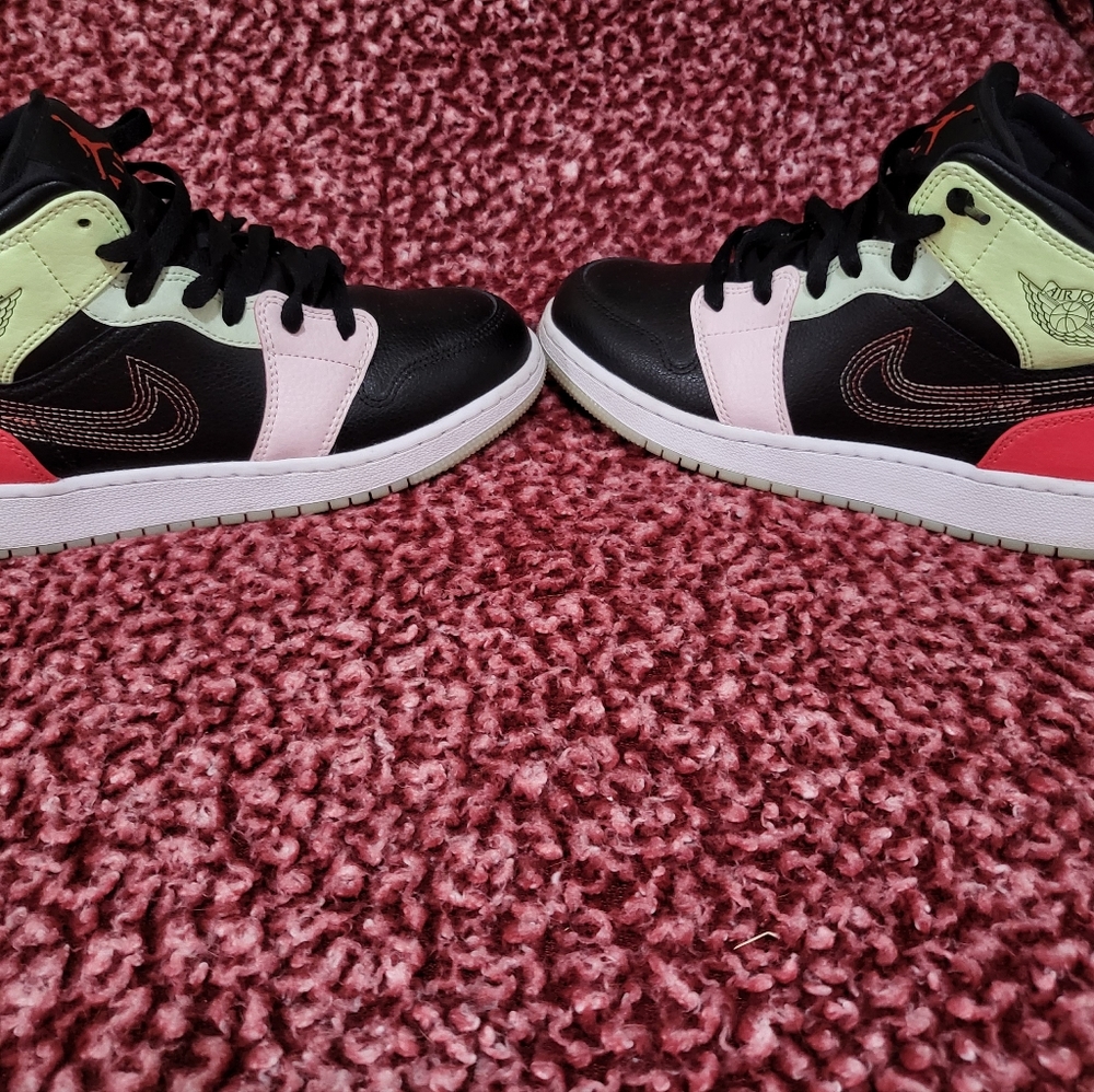 Air Jordan 1 black, pink, red, and mint green color.
